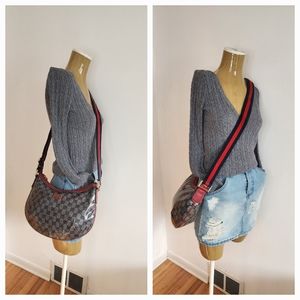 GUCCI GG Crystal Canvas Half Moon Crossbody Bag